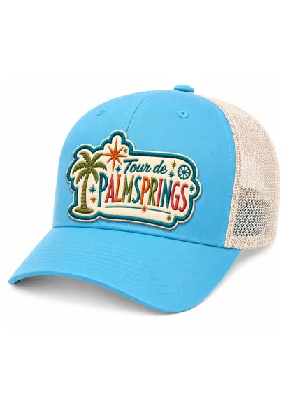 Aqua trucker cap with a Tour de Palm Springs patch and a cream mesh back, on white