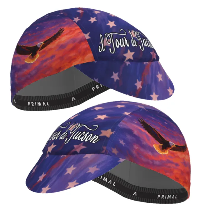 Two views of the 43rd El Tour cycling cap, purple sunset print with an eagle and stars, on white