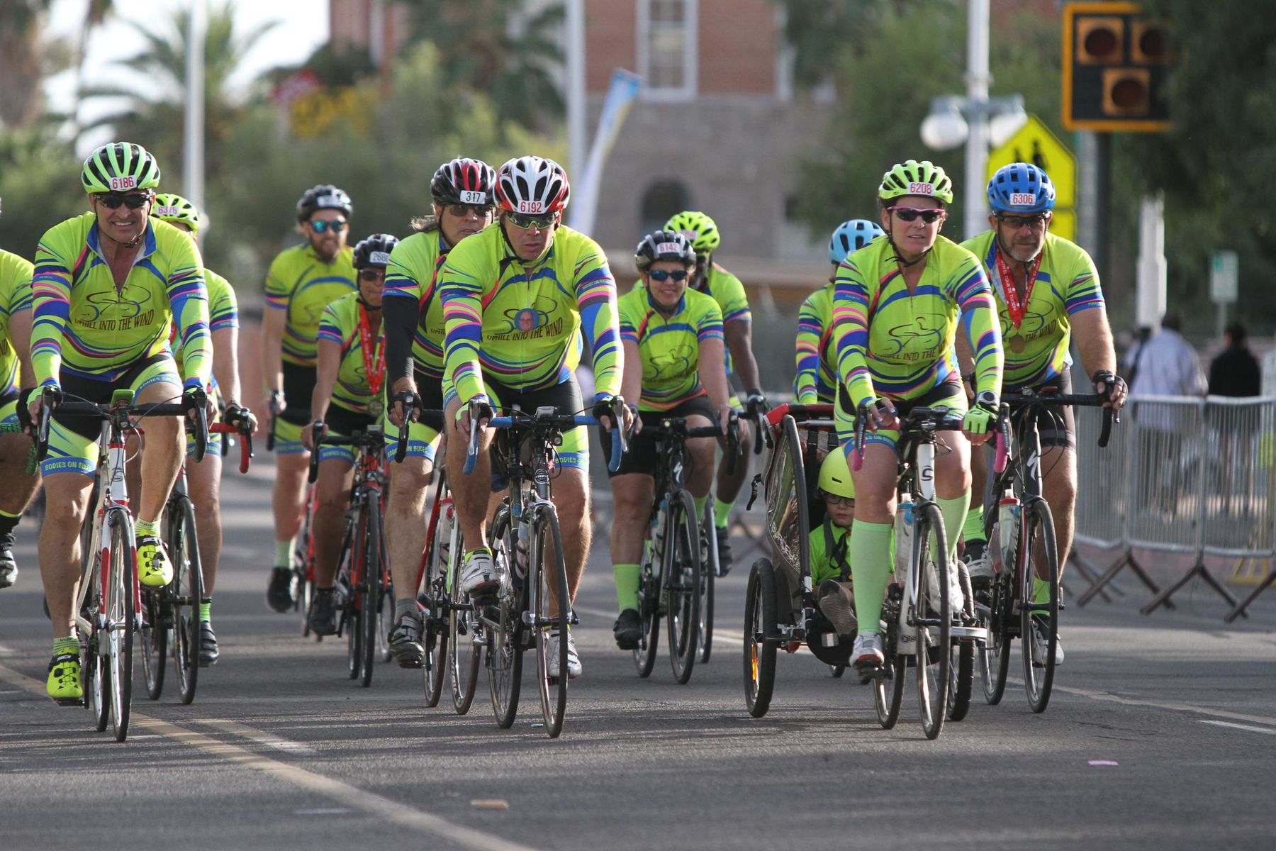 A group of riders on a Tucson street.